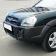 Бампер передний в цвет кузова Hyundai Tucson 1 (2004-2010) под расширители Бампер передний в цвет кузова Hyundai Tucson 1 (2004-2010) под расширители