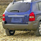 Бампер задний в цвет кузова Hyundai Tucson 1 (2004-2010) под две трубы и расширители Бампер задний в цвет кузова Hyundai Tucson 1 (2004-2010) под две трубы и расширители